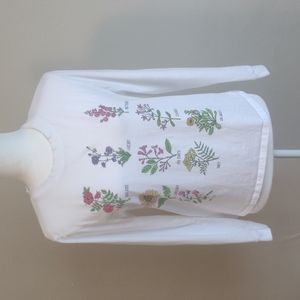 Messy Bun Just Chillin' brand.  Top with flowers. Long sleeve.  White. Size M